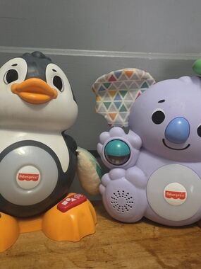 Fisher-Price Purple Koala & Black Penguin Musical Toy Set